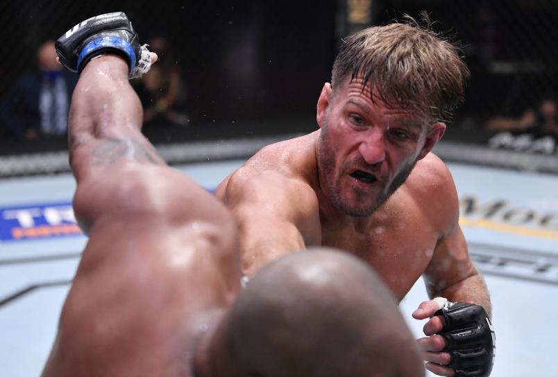 Stipe Miocic punches Daniel Cormier in their UFC heavyweight championship bout during the UFC 252 event at UFC APEX on August 15, 2020 in Las Vegas, Nevada. (Photo by Jeff Bottari/Zuffa LLC)