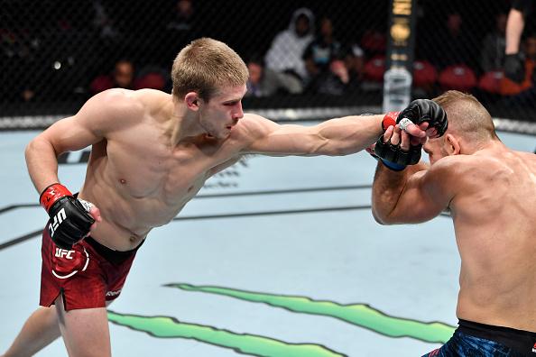 Arnold Allen of England punches Nik Lentz in their featherweight bout during the UFC Fight Night event at PNC Arena on January 25, 2020 in Raleigh, North Carolina. (Photo by Jeff Bottari/Zuffa LLC)