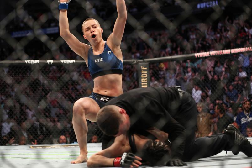 Rose Namajunas of the United States celebrates after beating Zhang Weili of China during the Women's Strawweight Title bout of UFC 261 at VyStar Veterans Memorial Arena on April 24, 2021 in Jacksonville, Florida. (Photo by Alex Menendez/Getty Images)