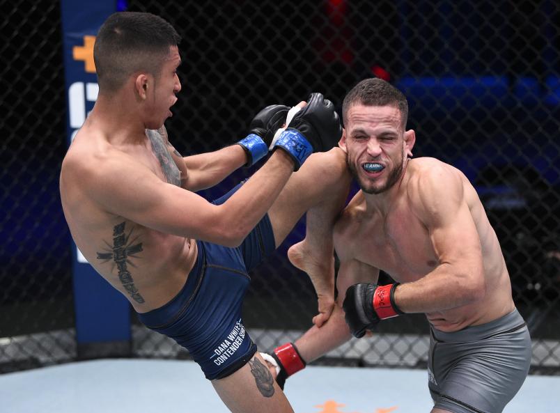 Jeffrey Molina knees Jacob Silva in a flyweight bout during week four of Dana White's Contender Series season four at UFC APEX on August 25, 2020 in Las Vegas, Nevada. (Photo by Chris Unger/DWCS LLC/Zuffa LLC)