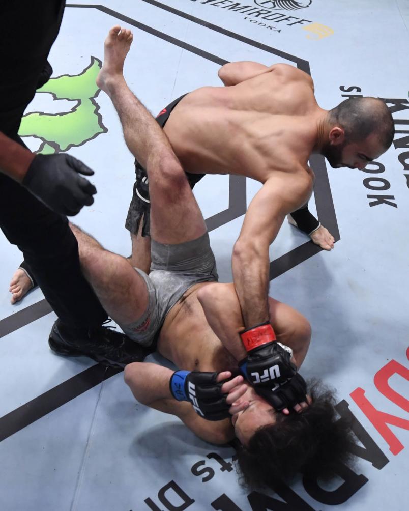 Giga Chikadze of Georgia punches Jamey Simmons in a featherweight fight during the UFC Fight Night event at UFC APEX on November 07, 2020 in Las Vegas, Nevada. (Photo by Jeff Bottari/Zuffa LLC)