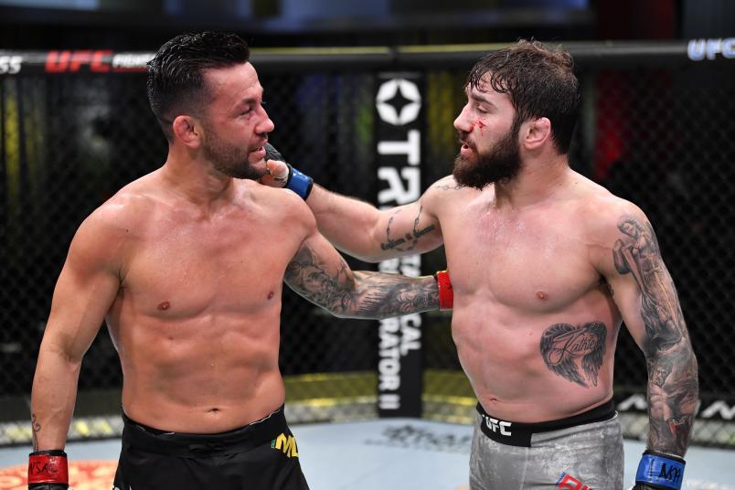 Pedro Munhoz of Brazil and Jimmie Rivera talk after their bantamweight bout during the UFC Fight Night event at UFC APEX on February 27, 2021 in Las Vegas, Nevada. (Photo by Jeff Bottari/Zuffa LLC)