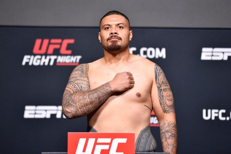 Justin Tafa of New Zealand poses on the scale during the UFC Fight Night weigh-in at UFC APEX on May 21, 2021 in Las Vegas, Nevada. (Photo by Chris Unger/Zuffa LLC)