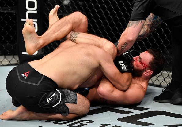 Paul Craig of Scotland secures a triangle choke against Gadzhimurad Antigulov of Russia in their light heavyweight fight during the UFC Fight Night event inside Flash Forum on UFC Fight Island on July 26, 2020 in Yas Island, Abu Dhabi, United Arab Emirates. (Photo by Jeff Bottari/Zuffa LLC)