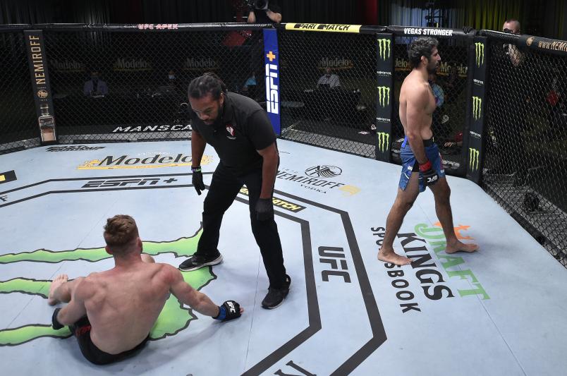 Beneil Dariush of Iran reacts after his knockout victory over Scott Holtzman in their lightweight fight during the UFC Fight Night event at UFC APEX on August 08, 2020 in Las Vegas, Nevada. (Photo by Chris Unger/Zuffa LLC)