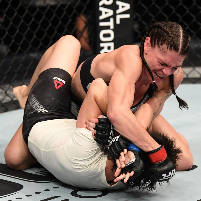 Lauren Murphy punches Liliya Shakirova of Uzbekistan in their women's flyweight bout during the UFC 254 event on October 24, 2020 on UFC Fight Island, Abu Dhabi, United Arab Emirates. (Photo by Josh Hedges/Zuffa LLC via Getty Images)