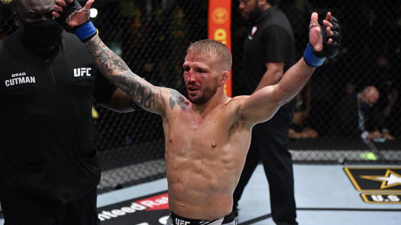 T.J. Dillashaw reacts after his split-decision victory over Corey Sandhagen in their bantamweight fight during the UFC Fight Night event at UFC APEX on July 24 2021 in Las Vegas Nevada. (Photo by Jeff Bottari/Zuffa LLC)