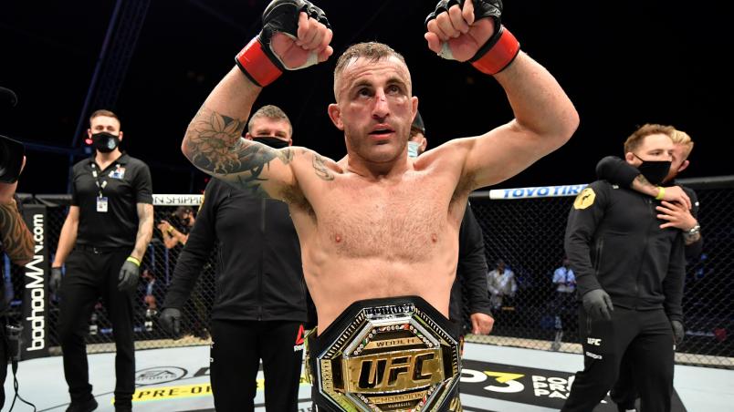 Alexander Volkanovski of Australia celebrates after his split-decision victory over Max Holloway in their UFC featherweight championship fight during the UFC 251 event at Flash Forum on UFC Fight Island on July 12 2020 on Yas Island Abu Dhabi United Arab Emirates. (Photo by Jeff Bottari/Zuffa LLC)