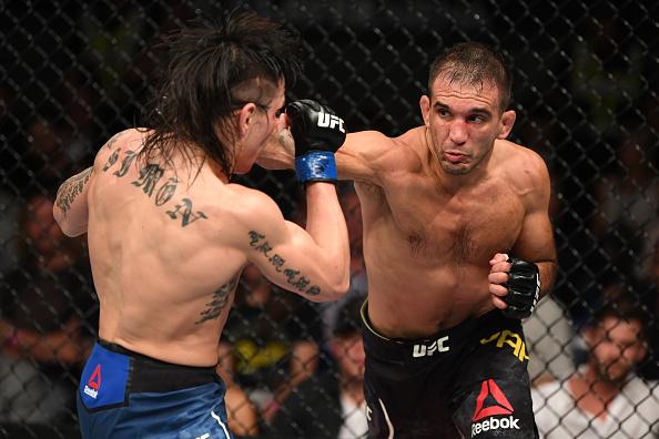 Rani Yahya of Brazil punches Ricky Simon in their bantamweight bout during the UFC 234 at the Rod Laver Arena on February 10, 2019 in the Melbourne, Australia. (Photo by Jeff Bottari/Zuffa LLC)