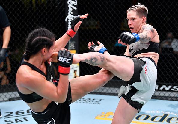 Macy Chiasson and Marion Reneau trade kicks in their bantamweight fight during the UFC Fight Night event at UFC APEX on March 20, 2021 in Las Vegas, Nevada. (Photo by Chris Unger/Zuffa LLC)