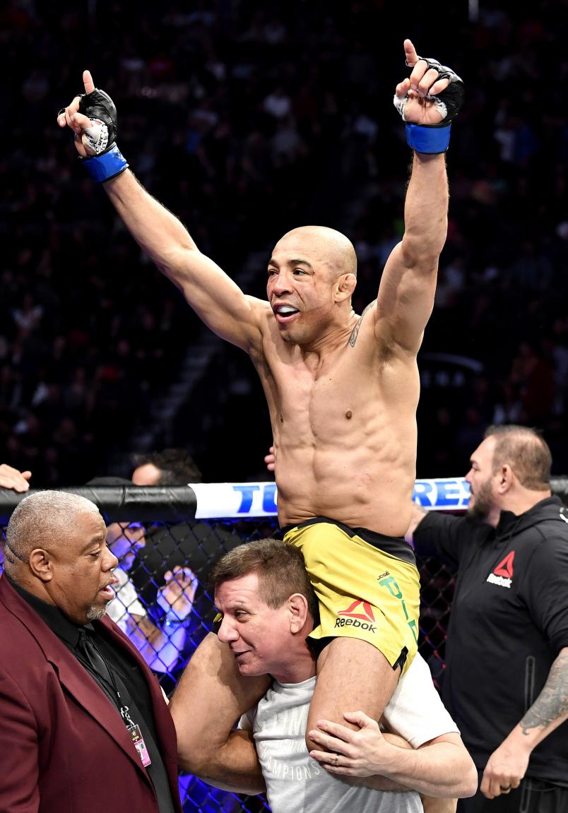 Jose Aldo of Brazil celebrates in the octagon after his bantamweight bout during the UFC 245 event at T-Mobile Arena on December 14, 2019 in Las Vegas, Nevada. (Photo by Jeff Bottari/Zuffa LLC)