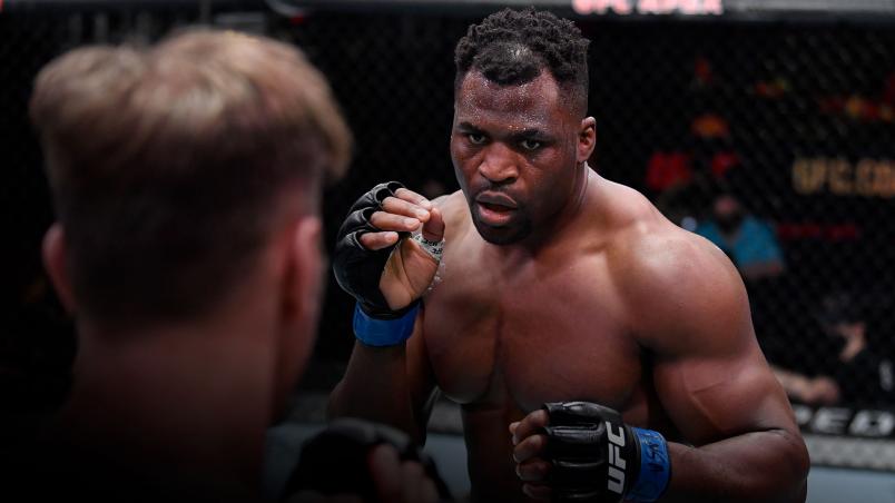 rancis Ngannou of Cameroon battles Stipe Miocic in their UFC heavyweight championship fight during the UFC 260 event at UFC APEX on March 27, 2021 in Las Vegas, Nevada.