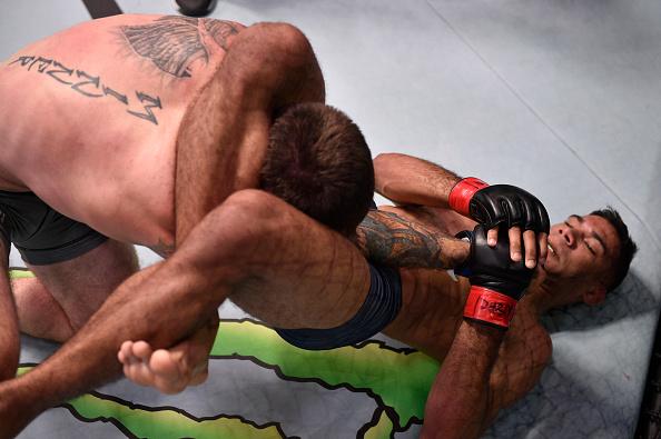 Herbert Burns secures a triangle arm bar against Darrick Minner in their featherweight bout during week seven of Dana White's Contender Series on August 06, 2019 in Las Vegas, Nevada. (Photo by Chris Unger/DWCS LLC/Zuffa LLC)