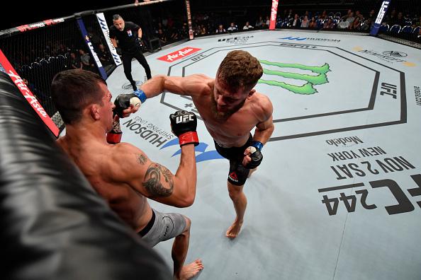 Rafael Fiziev of Kazakhstan punches Alex White in their lightweight bout during the UFC Fight Night event at Singapore Indoor Stadium on October 26, 2019 in Singapore. (Photo by Jeff Bottari/Zuffa LLC)