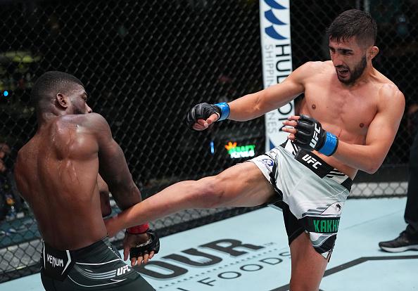 Saidyokub Kakhramonov of Uzbekistan kicks Trevin Jones of Guam in a bantamweight fight during the UFC Fight Night event at UFC APEX on August 21, 2021 in Las Vegas, Nevada. (Photo by Chris Unger/Zuffa LLC)