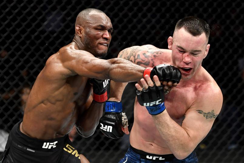 Kamaru Usman of Nigeria strikes Colby Covington