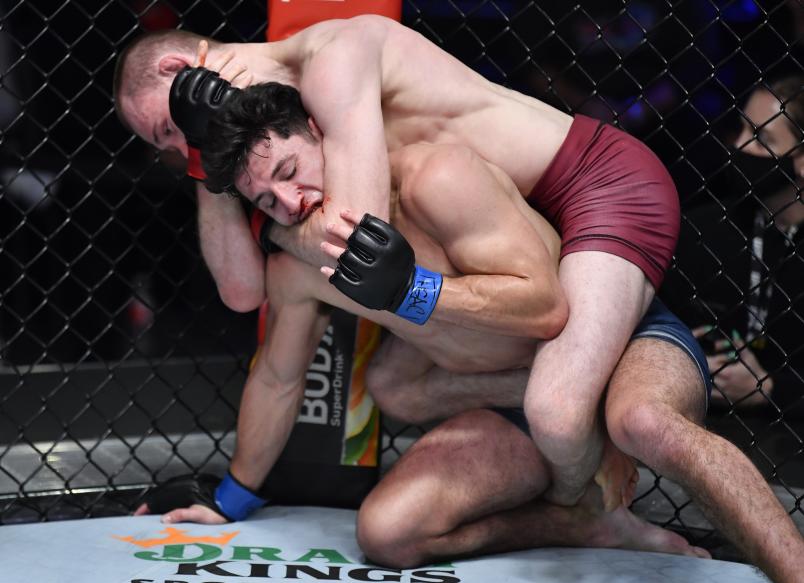 Jake Hadley secures a rear choke submission against Mitch Raposo in a flyweight fight during Dana White's Contender Series season five, week seven at UFC APEX on October 12, 2021 in Las Vegas, Nevada. (Photo by Chris Unger/Zuffa LLC)