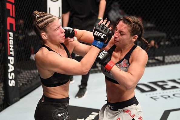 Liana Jojua of Georgia punches Miranda Maverick in their women's flyweight bout during the UFC 254 event on October 24, 2020 on UFC Fight Island, Abu Dhabi, United Arab Emirates. (Photo by Josh Hedges/Zuffa LLC)