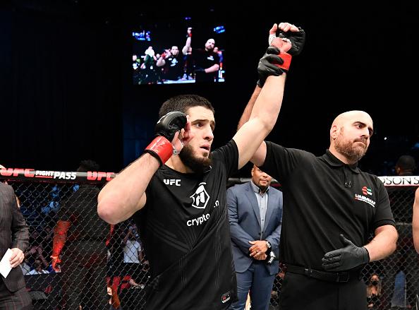 Islam Makhachev of Russia celebrates after his submission victory over Dan Hooker of New Zealand in a lightweight fight during the UFC 267 event at Etihad Arena on October 30, 2021 in Yas Island, Abu Dhabi, United Arab Emirates. (Photo by Chris Unger/Zuffa LLC)