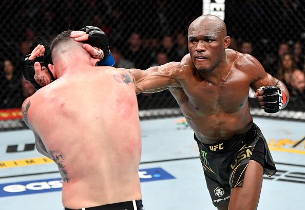 Kamaru Usman of Nigeria punches Colby Covington in their UFC welterweight championship fight during the UFC 268 event at Madison Square Garden on November 06, 2021 in New York City. (Photo by Jeff Bottari/Zuffa LLC)