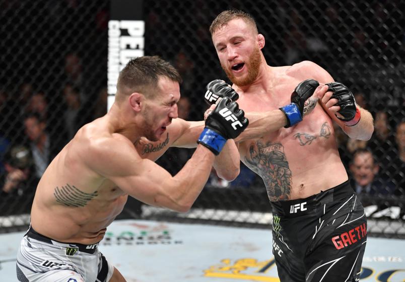 Justin Gaethje punches Michael Chandler in their lightweight fight during the UFC 268 event at Madison Square Garden on November 06, 2021 in New York City. (Photo by Jeff Bottari/Zuffa LLC)