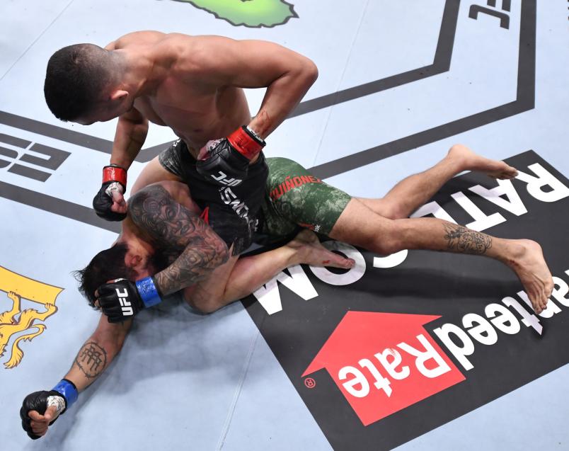 Louis Smolka punches Jose Quinonez of Mexico in a bantamweight bout during the UFC Fight Night event at UFC APEX on December 05, 2020 in Las Vegas, Nevada. (Photo by Chris Unger/Zuffa LLC)