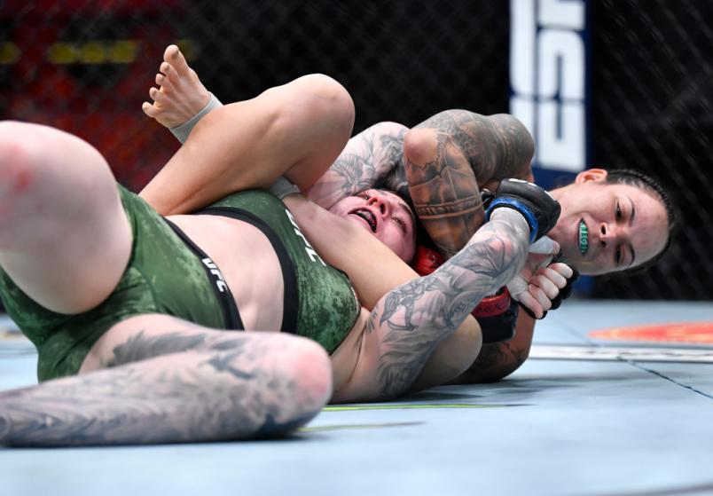 Amanda Nunes of Brazil secures an arm bar submission against Megan Anderson of Australia in their UFC featherweight championship fight during the UFC 259 event at UFC APEX on March 06, 2021 in Las Vegas, Nevada. (Photo by Chris Unger/Zuffa LLC)