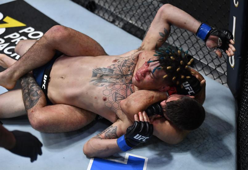Mickey Gall secures a rear choke submission against Jordan Williams in their welterweight fight during the UFC Fight Night event at UFC APEX on July 24, 2021 in Las Vegas, Nevada. (Photo by Jeff Bottari/Zuffa LLC)
