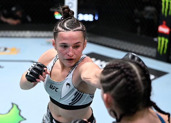 Erin Blanchfield punches Sarah Alpar in a flyweight fight during the UFC Fight Night event at UFC APEX on September 18, 2021 in Las Vegas, Nevada. (Photo by Jeff Bottari/Zuffa LLC)