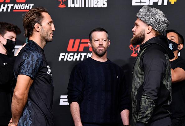 Opponents Brad Riddell of New Zealand and Rafael Fiziev of Kyrgyzstan face off during the UFC Fight Night weigh-in at UFC APEX on December 03, 2021 in Las Vegas, Nevada. (Photo by Chris Unger/Zuffa LLC)