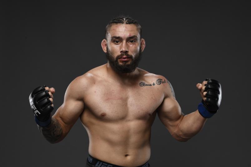 Rogerio Bontorin of Brazil poses for a post fight portrait backstage during the UFC 262 event at Toyota Center on May 15, 2021 in Houston, Texas. (Photo by Mike Roach/Zuffa LLC)