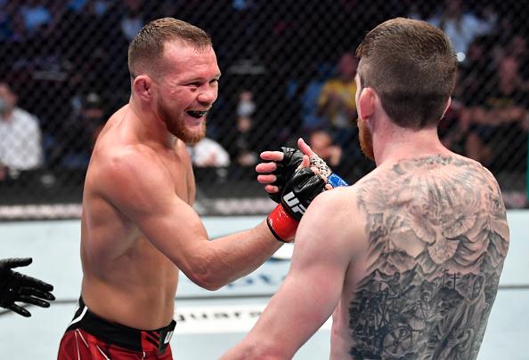 Petr Yan of Russia and Cory Sandhagen shake hands after their UFC interim bantamweight championship fight during the UFC 267 event at Etihad Arena on October 30, 2021 in Yas Island, Abu Dhabi, United Arab Emirates. (Photo by Chris Unger/Zuffa LLC)
