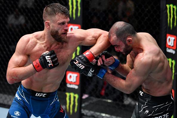 Calvin Kattar elbows Giga Chikadze of Georgia in their featherweight fight during the UFC Fight Night event at UFC APEX on January 15, 2022 in Las Vegas, Nevada. (Photo by Jeff Bottari/Zuffa LLC)
