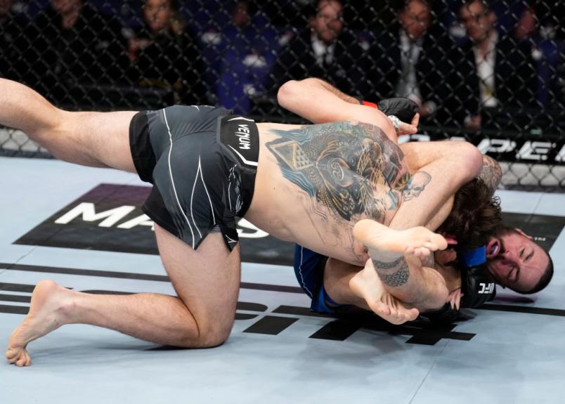 LONDON, ENGLAND - MARCH 19: (R-L) Paul Craig of Scotland attempts to submit Nikita Krylov of Ukraine in a light heavyweight fight during the UFC Fight Night event at O2 Arena on March 19, 2022 in London, England. (Photo by Chris Unger/Zuffa LLC)