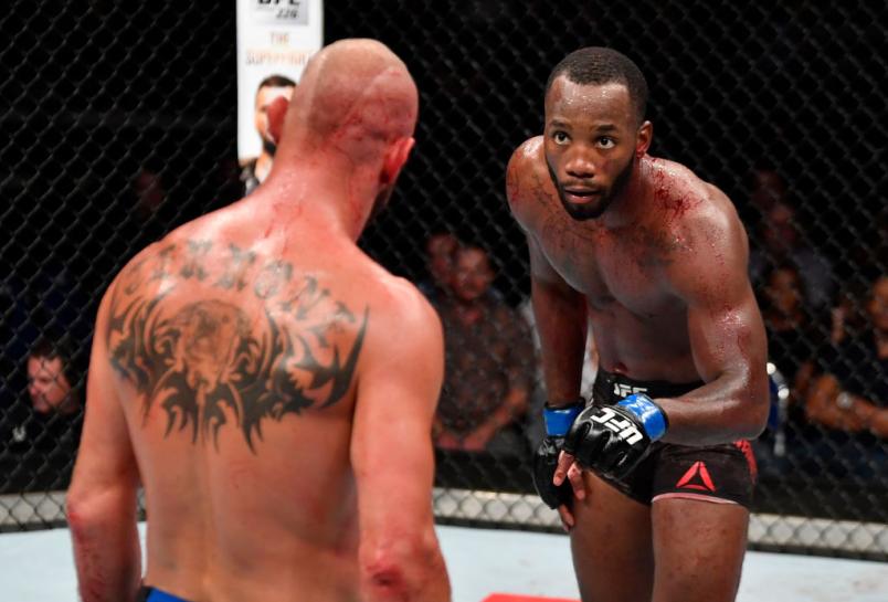 Leon Edwards of Jamaica taunts Donald Cerrone in their welterweight bout during the UFC Fight Night event at the Singapore Indoor Stadium on June 23, 2018 in Singapore. (Photo by Jeff Bottari/Zuffa LLC/Zuffa LLC via Getty Images)