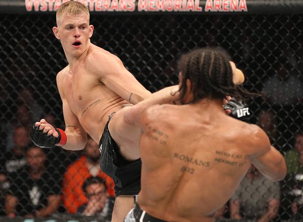 Ian Garry of Ireland kicks Darian Weeks in their welterweight fight during the UFC 273 event at VyStar Veterans Memorial Arena on April 09, 2022 in Jacksonville, Florida. (Photo by Jeff Bottari/Zuffa LLC)