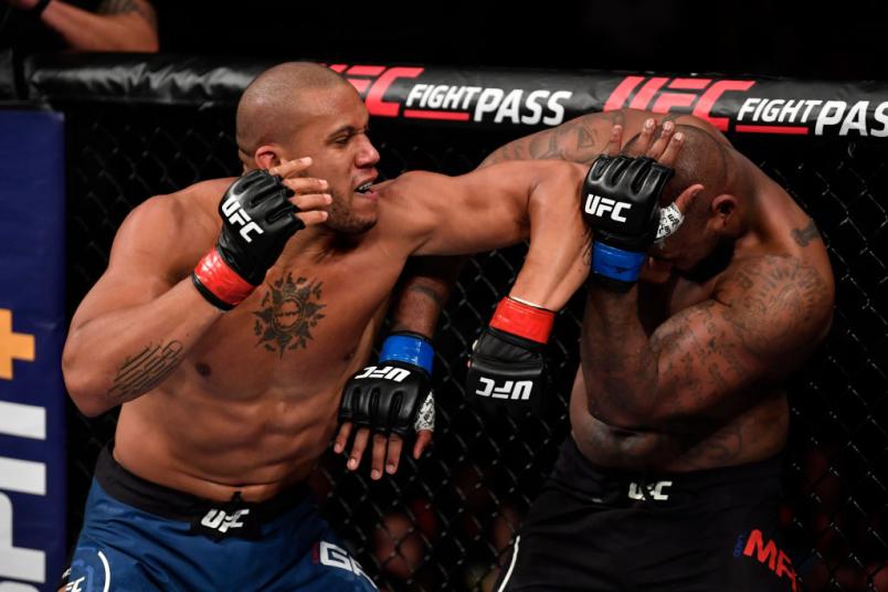 Ciryl Gane of France elbows Don'Tale Mayes in their heavyweight bout during the UFC Fight Night event at Singapore Indoor Stadium on October 26, 2019 in Singapore. (Photo by Jeff Bottari/Zuffa LLC via Getty Images)