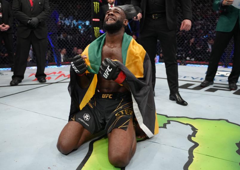 Aljamain Sterling celebrates after defeating Petr Yan of Russia in their UFC bantamweight championship fight during the UFC 273 event at VyStar Veterans Memorial Arena on April 09, 2022 in Jacksonville, Florida. (Photo by Jeff Bottari/Zuffa LLC)