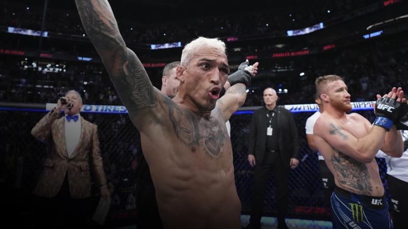 Charles Oliveira of Brazil reacts after his submission victory over Justin Gaethje in the UFC lightweight championship fight during the UFC 274 event at Footprint Center on May 07, 2022 in Phoenix, Arizona. (Photo by Chris Unger/Zuffa LLC)