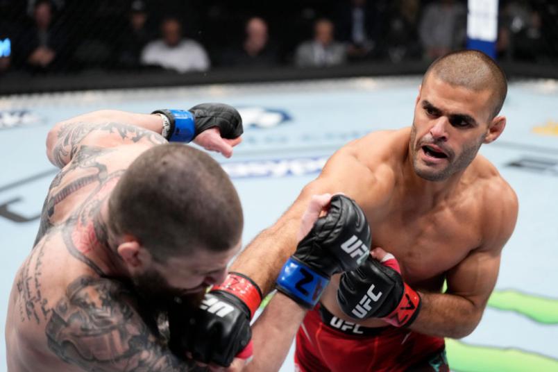 André Fialho punches Cameron VanCamp at UFC 274