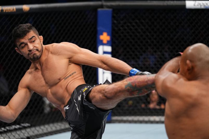 Andre Muniz kicks Ronaldo Souza of Brazil in their middleweight bout during the UFC 262 event at Toyota Center on May 15, 2021 in Houston, Texas. (Photo by Josh Hedges/Zuffa LLC)