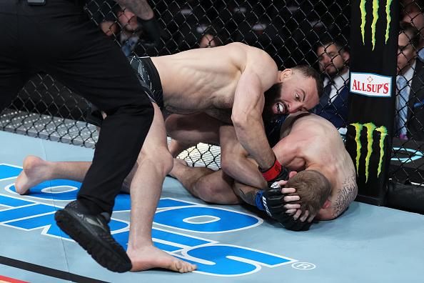  Roman Dolidze of Georgia punches Kyle Daukaus in a middleweight fight during the UFC Fight Night event at Moody Center on June 18, 2022 in Austin, Texas. (Photo by Josh Hedges/Zuffa LLC)