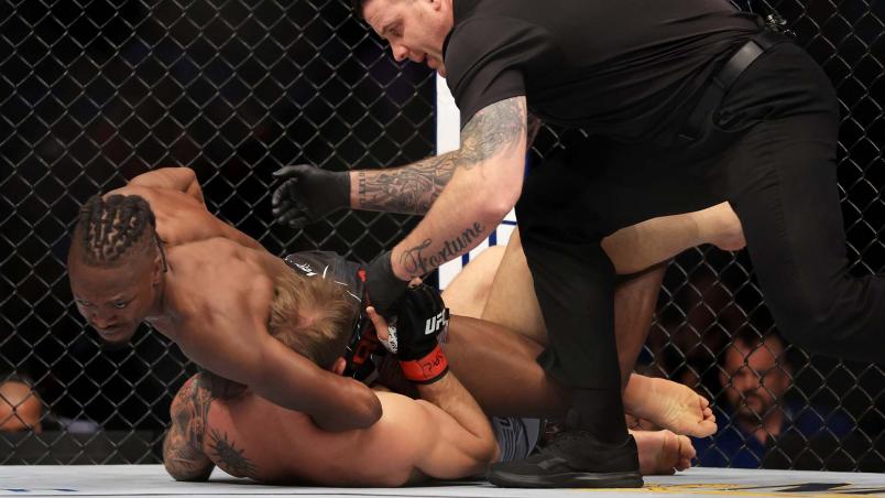 LAS VEGAS, NEVADA - JULY 02: Jalin Turner submits Brad Riddell of New Zealand in a lightweight fight during the UFC 276 event at T-Mobile Arena on July 02, 2022 in Las Vegas, Nevada. (Photo by Jeff Bottari/Zuffa LLC)