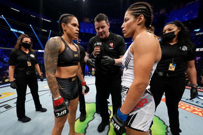 Amanda Nunes of Brazil and Julianna Pena meet during their UFC bantamweight championship bout during the UFC 269 on December 11, 2021 in Las Vegas, Nevada. (Photo by Jeff Bottari/Zuffa LLC)