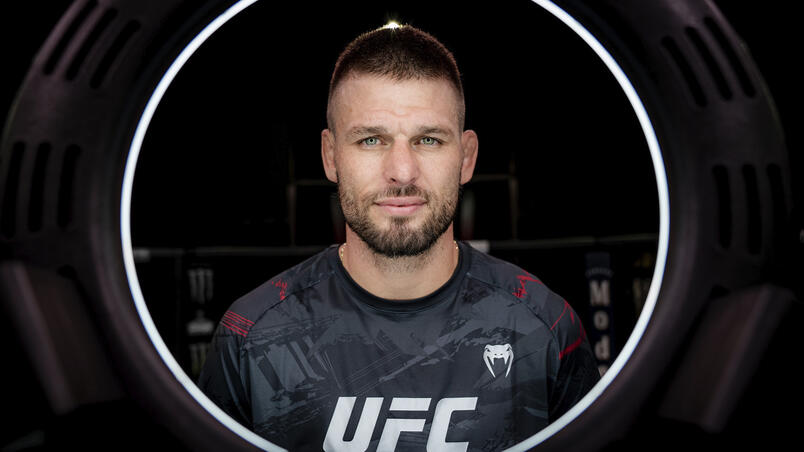 Tim Means poses in the UFC APEX Octagon ahead of his UFC Fight Night: Kattar vs Allen co-main event bout against Max Griffin