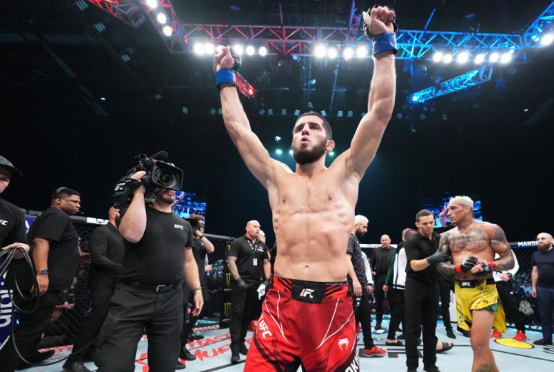 Islam Makhachev of Russia celebrates after his victory over Charles Oliveira of Brazil in their UFC lightweight championship fight during the UFC 280 event at Etihad Arena on October 22, 2022 in Abu Dhabi, United Arab Emirates. (Photo by Chris Unger/Zuffa LLC)