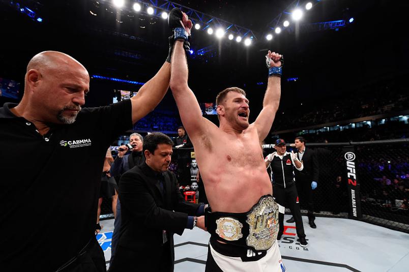 Stipe Miocic celebrates after defeating Fabricio Werdum of Brazil by KO in their UFC heavyweight championship bout during the UFC 198 event at Arena da Baixada stadium on May 14, 2016 in Curitiba, Parana, Brazil. (Photo by Josh Hedges/Zuffa LLC)