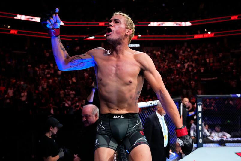 Bryan Battle celebrates his KO victory over Gabe Green in a welterweight fight during the UFC Fight Night event at Spectrum Center on May 13, 2023 in Charlotte, North Carolina. (Photo by Jeff Bottari/Zuffa LLC)