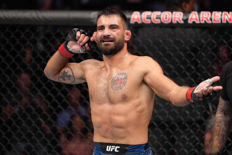 Benoit Saint Denis of France celebrates his TKO victory over Gabriel Miranda of Brazil in a lightweight fight during the UFC Fight Night event at The Accor Arena on September 03, 2022 in Paris, France. (Photo by Jeff Bottari/Zuffa LLC)