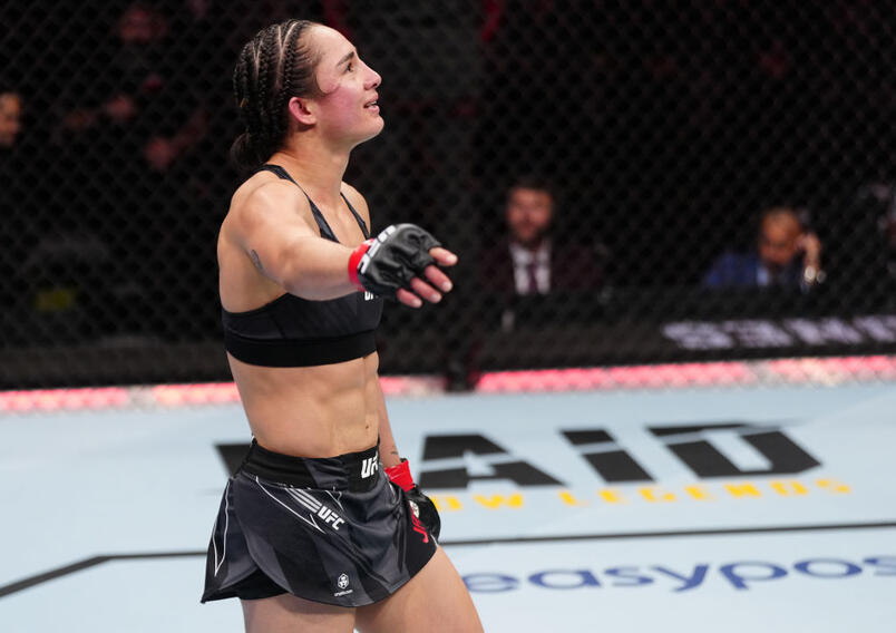 Yazmin Jauregui of Mexico reacts after her TKO victory over Istela Nunes of Brazil in a strawweight fight during the UFC Fight Night event at Amway Center on December 03, 2022 in Orlando, Florida. (Photo by Jeff Bottari/Zuffa LLC)